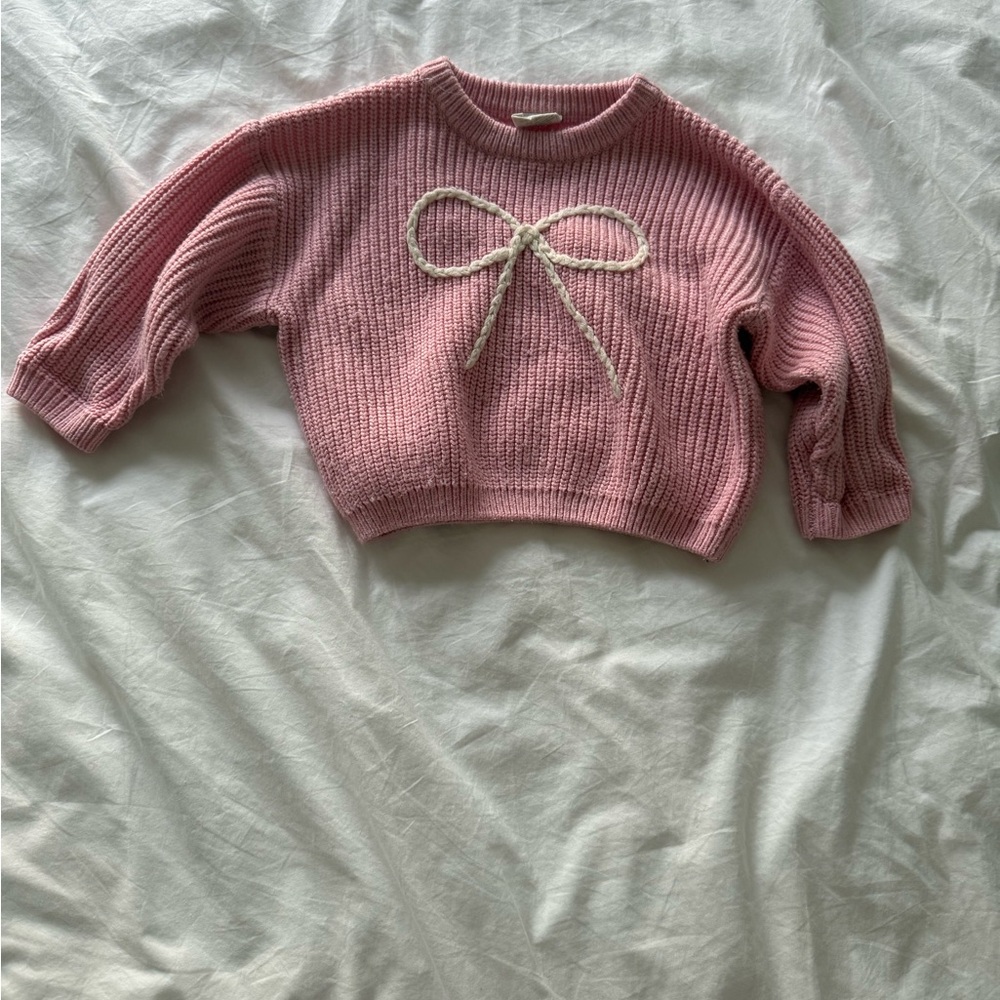Cozy Pink Knit Sweater with Bow Detail